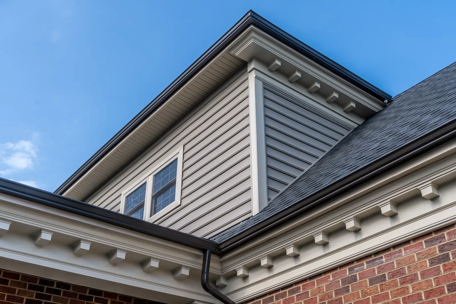 A residential aluminum gutter being installed. | New Jersey Gutter