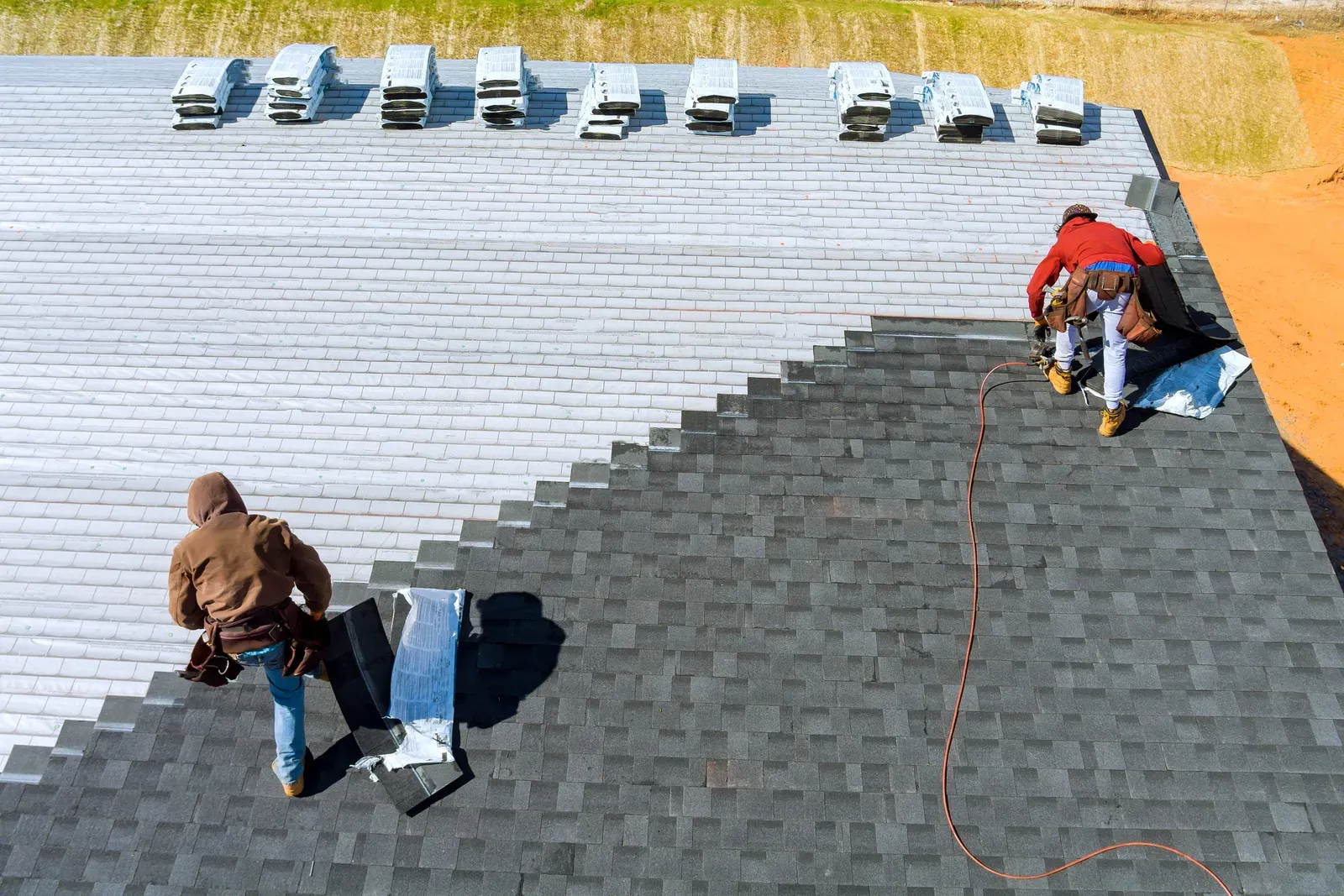 A newly installed asphalt residential roof, hero-approved. | New Jersey Gutter