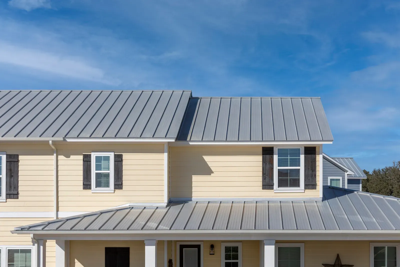 A photo of a newly installed metal residential roof, hero-approved. | New Jersey Gutter