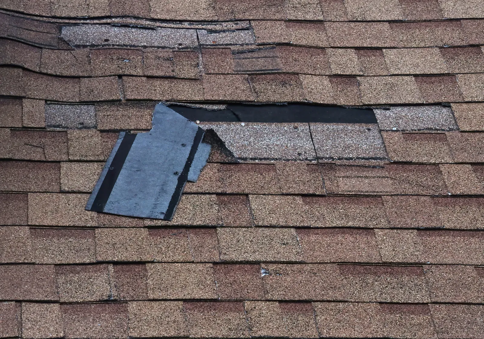 Roof repair on a residential asphalt roof, hero-approved | New Jersey Gutter