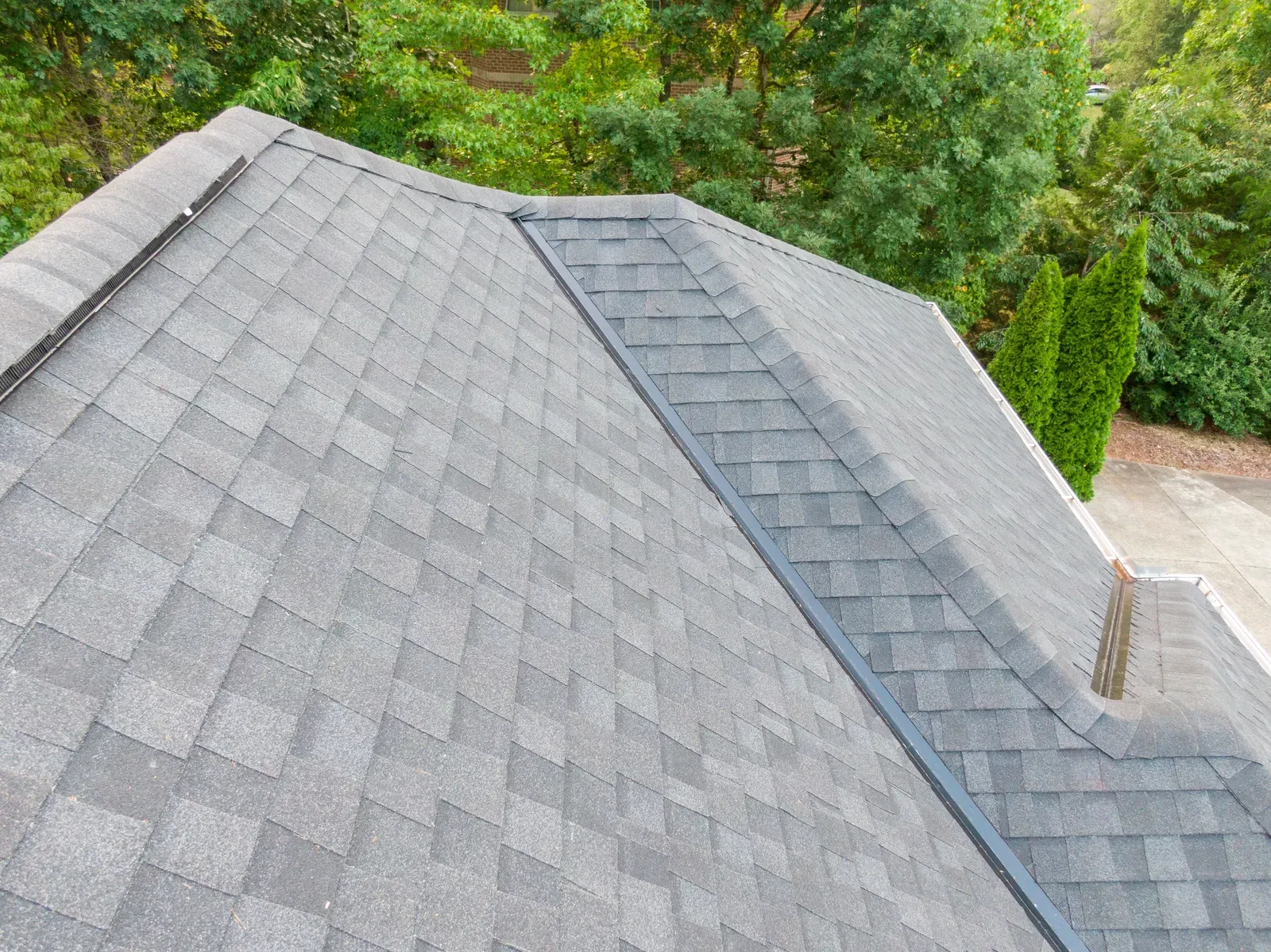 A new residential roof being replaced after impact. | New Jersey Gutter