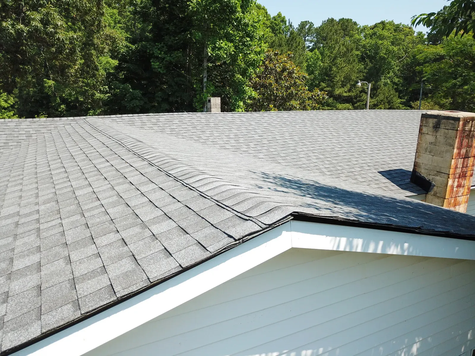 A residential roof being replaced due to impact, hero-approved. | New Jersey Gutter