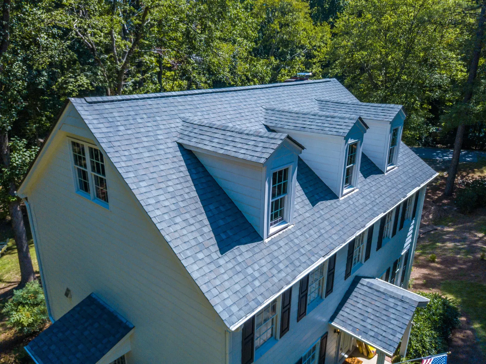 A residential asphalt roof being replaced. | New Jersey Gutter